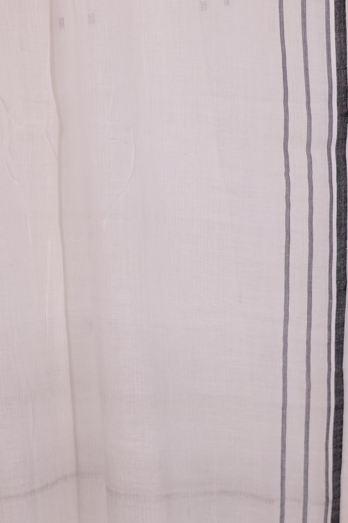 White Malai Cotton Saree with Butta Weaving | Looms & Tassels