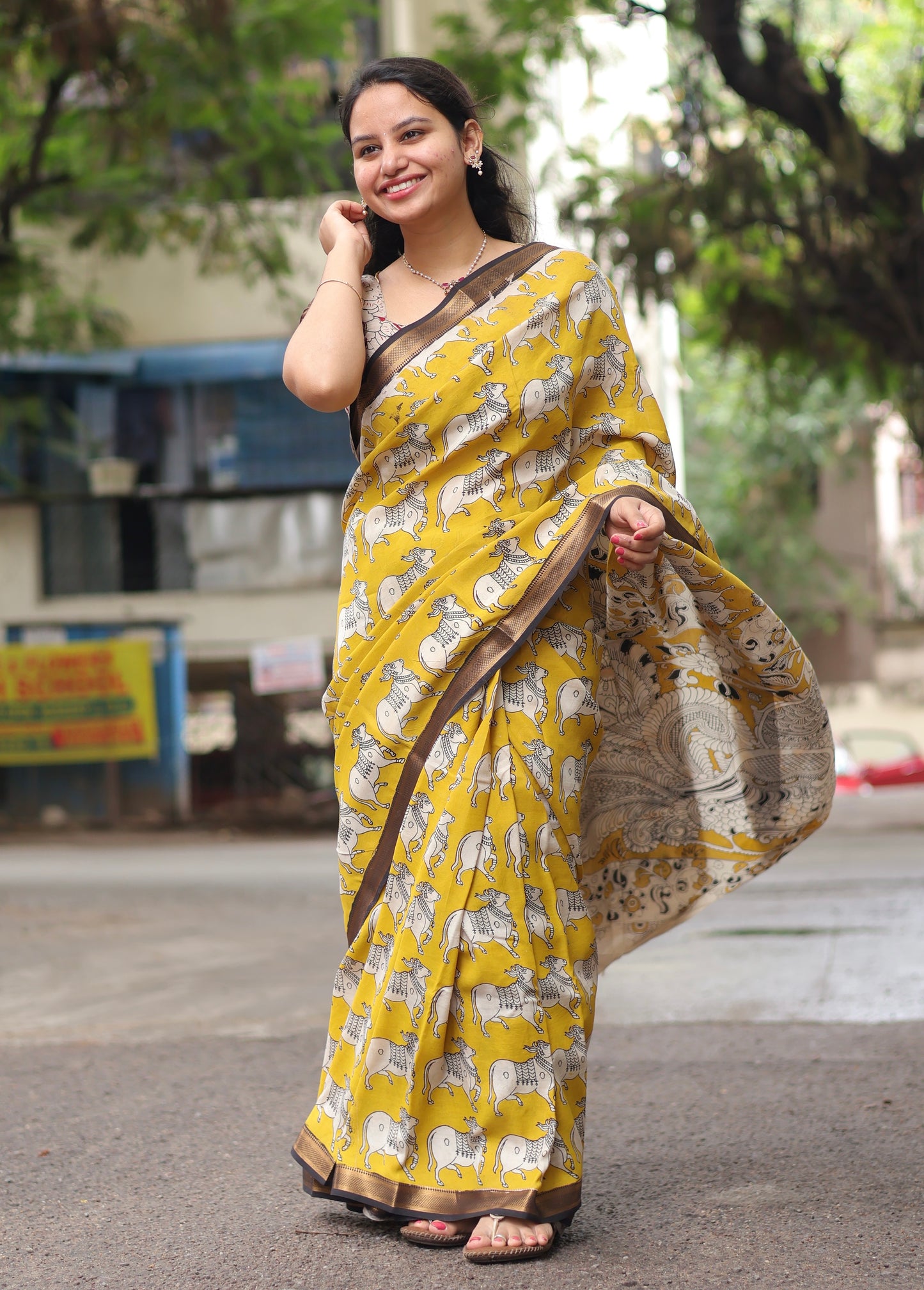 Yellow pichwai Nizam Border Kalamkari Silk Saree