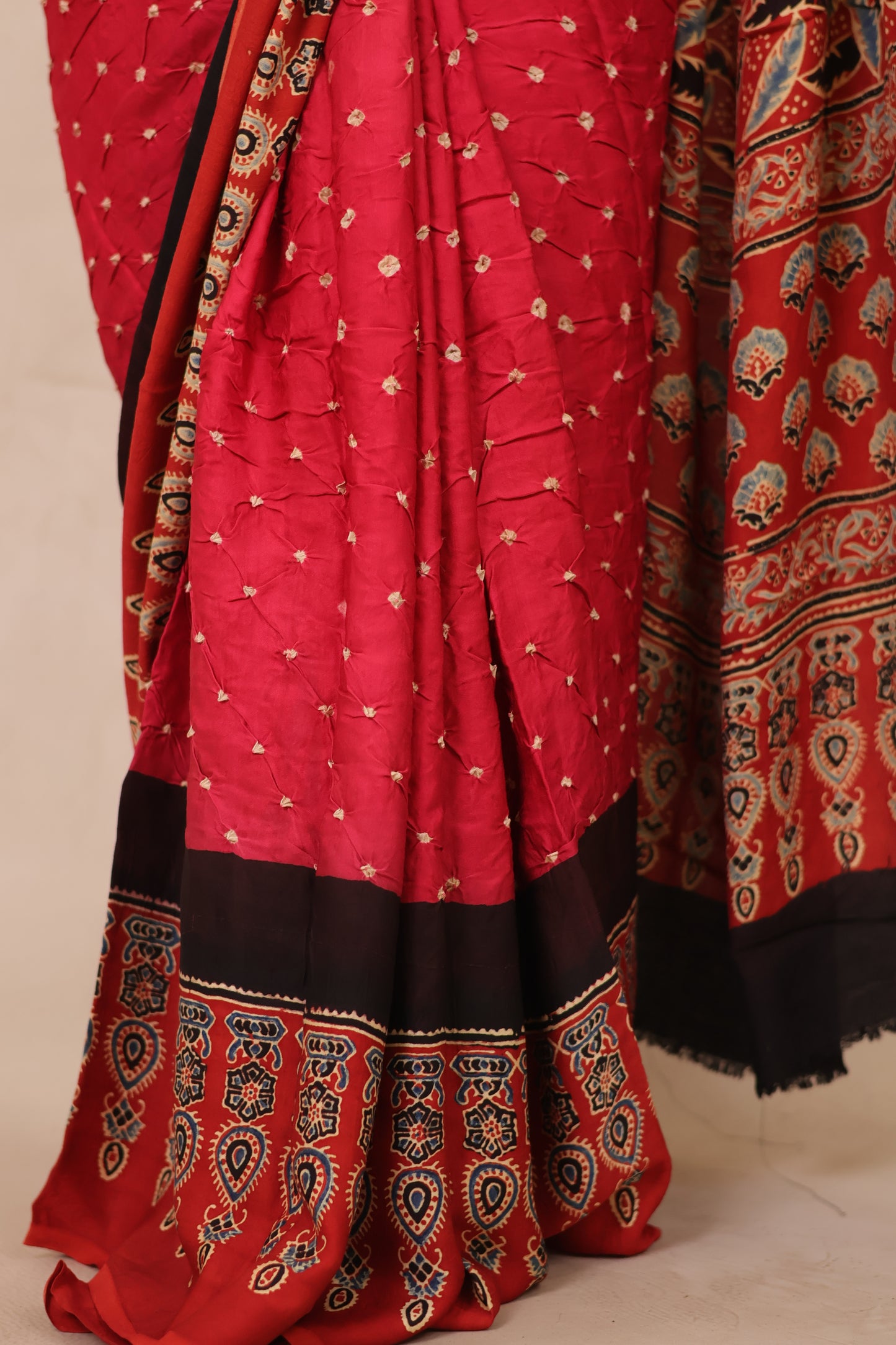 Pink Hand Knotted Ajrakh Bandhej Modal Silk Saree | Looms & Tassels