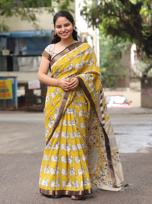 Yellow pichwai Nizam Border Kalamkari Silk Saree