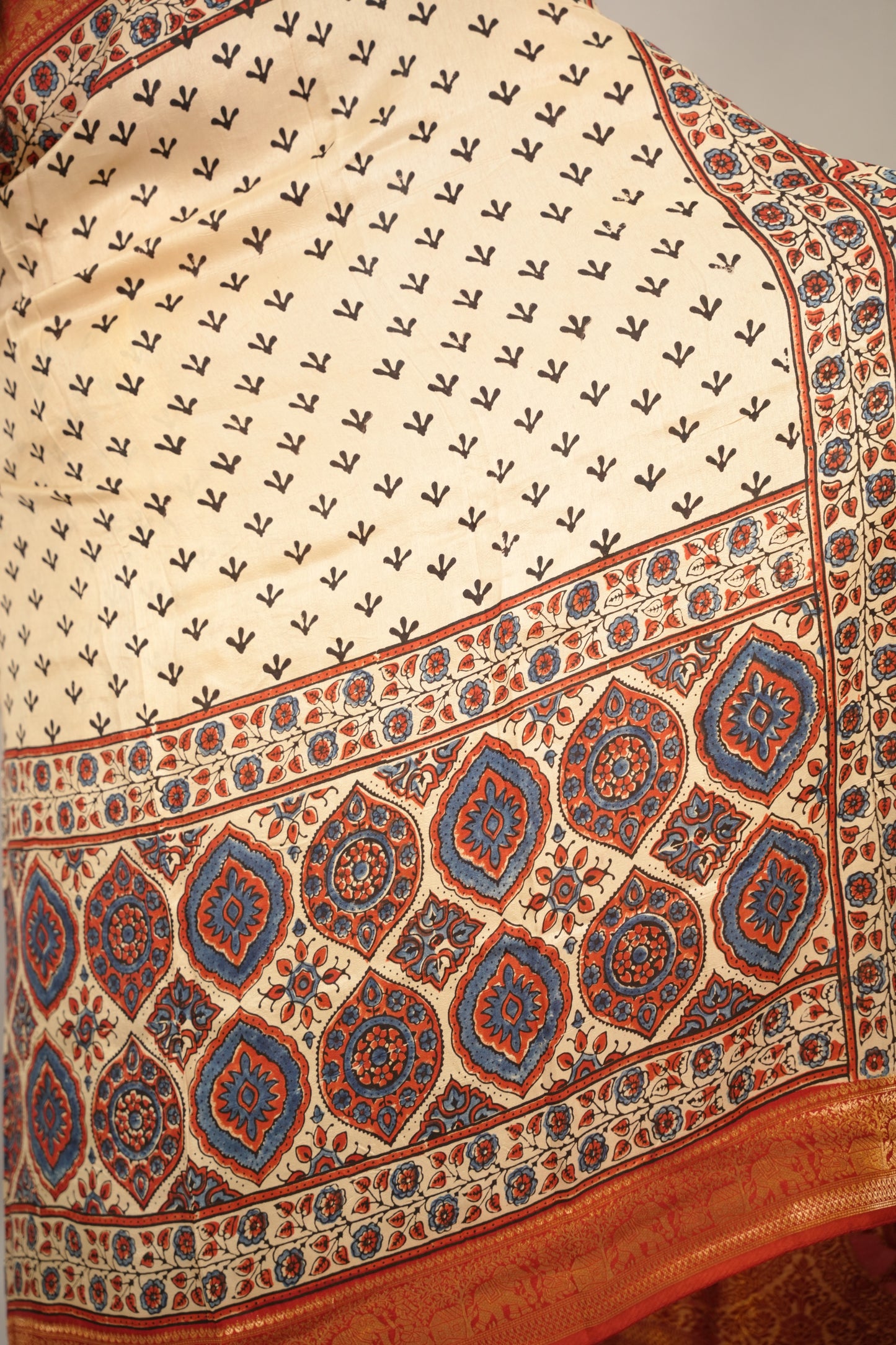 Cream Ajrakh Handblock printed Dola Silk Saree | Looms & Tassels