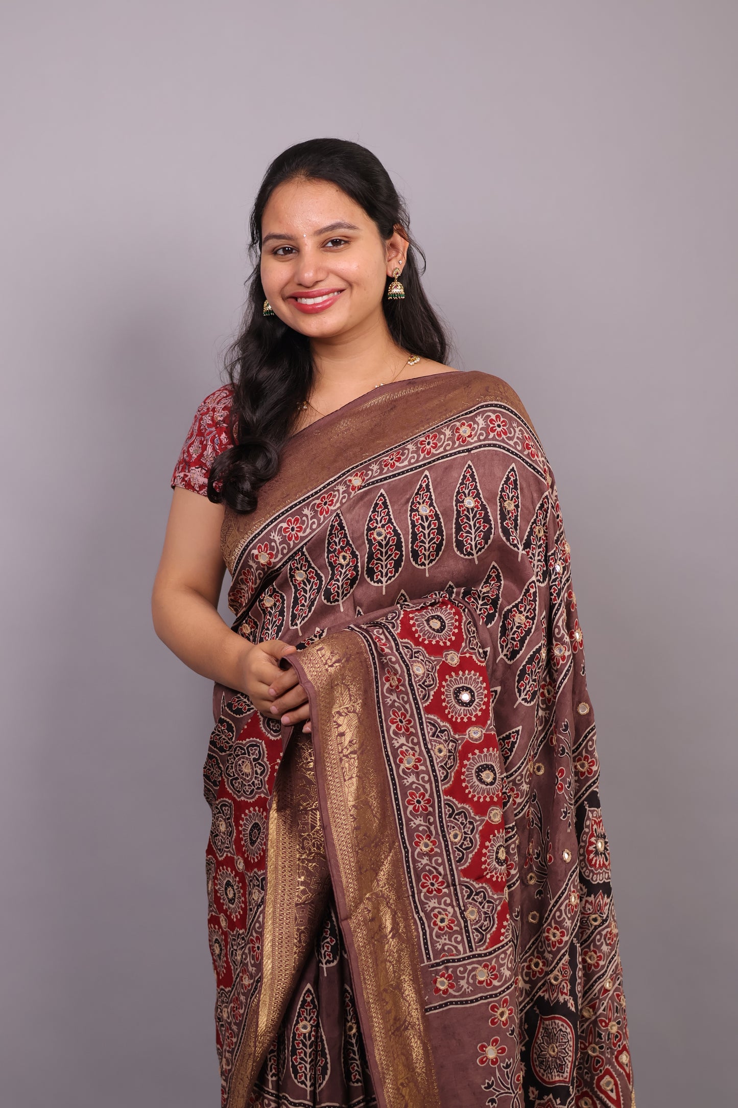 Handcrafted Ajrakh Dola Silk Saree with Authentic Banjara Mirror Work | Looms & Tassel