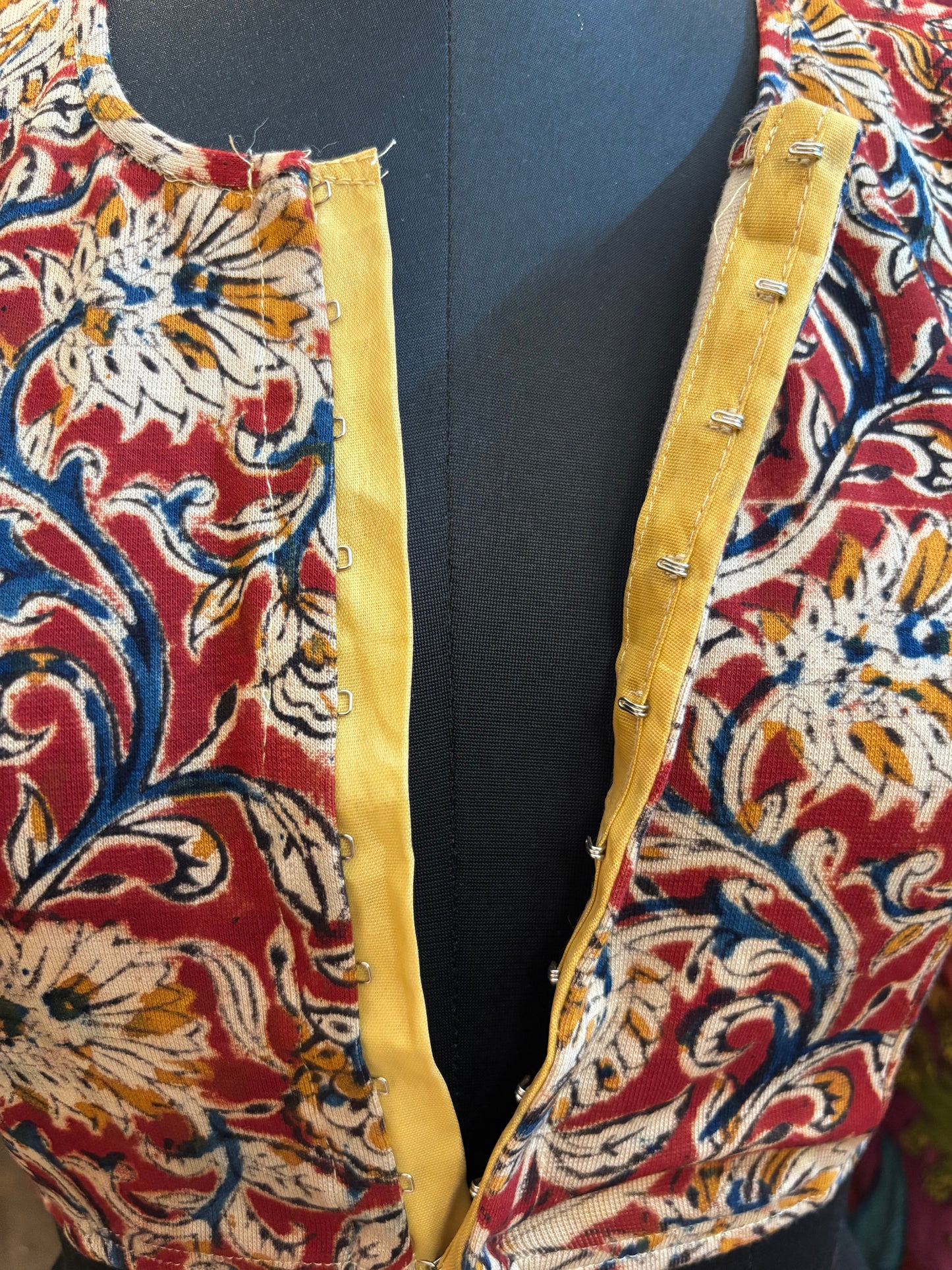 Red Round neck Stretchable Hand block printed kalamkari blouse with front hooks