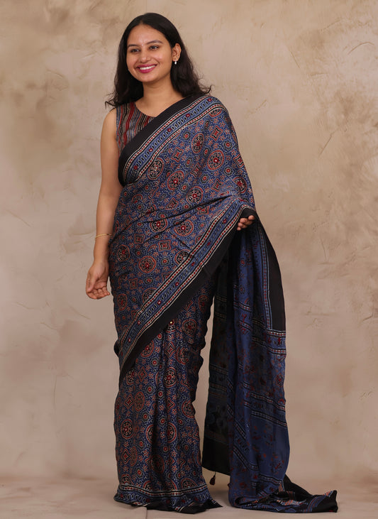 Indigo Handcrafted Ajrakh Modal Silk Saree with Authentic Banjara Mirror Work | Looms & Tassels