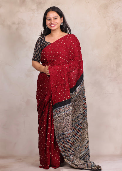 Maroon Hand Knotted Bandhej Modal Silk Saree with Ajrakh Pallu | Looms & Tassels