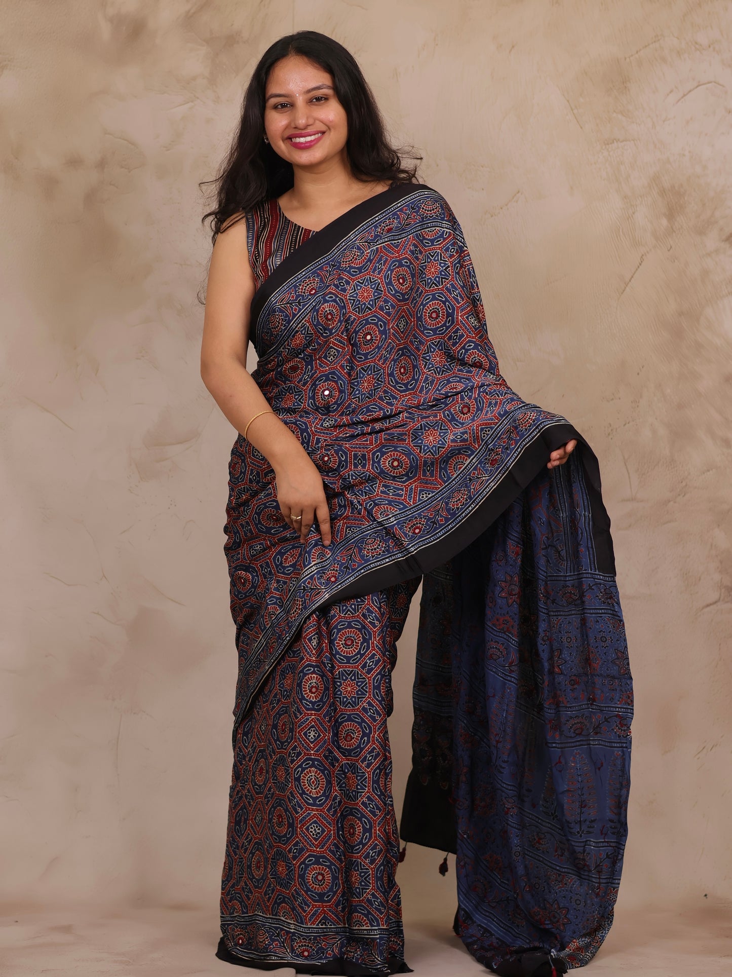 Indigo Handcrafted Ajrakh Modal Silk Saree with Authentic Banjara Mirror Work | Looms & Tassels