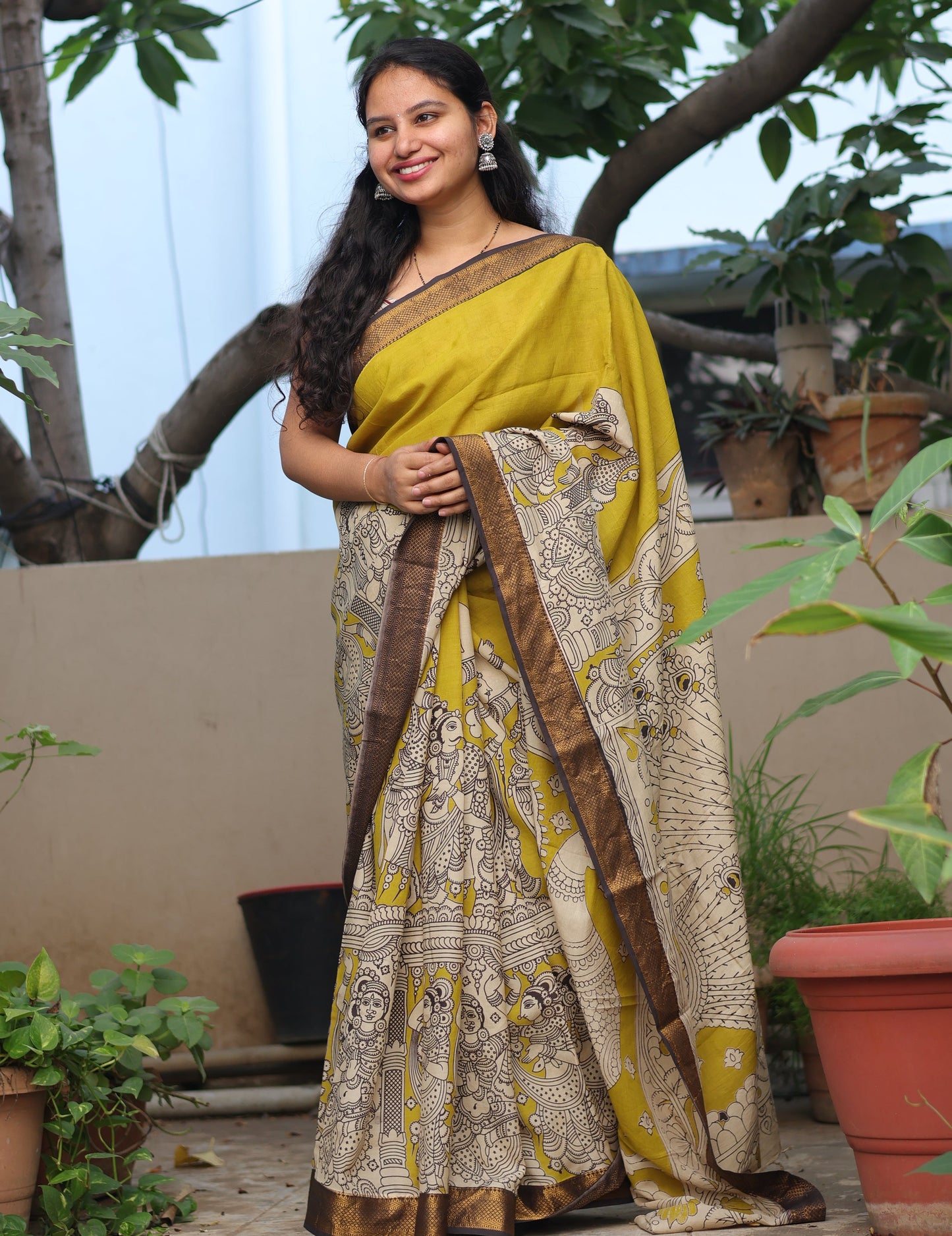 Mustard Traditional Folks Kalamkari Silk Handcrafted Nizam Border Saree