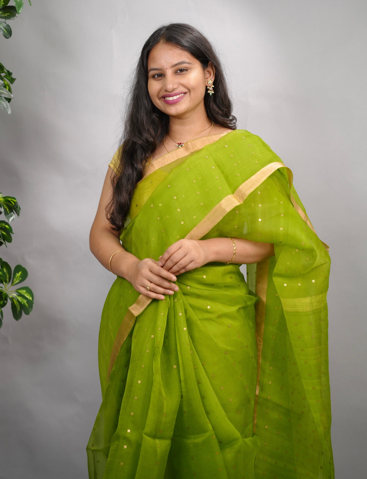 Parrot Green Handwoven Muslin Silk Saree With Sequence Work | Looms & Tassels