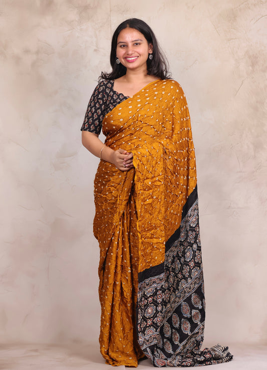 Mustard Hand Knotted Bandhej Modal Silk Saree with Ajrakh Pallu | Looms & Tassels