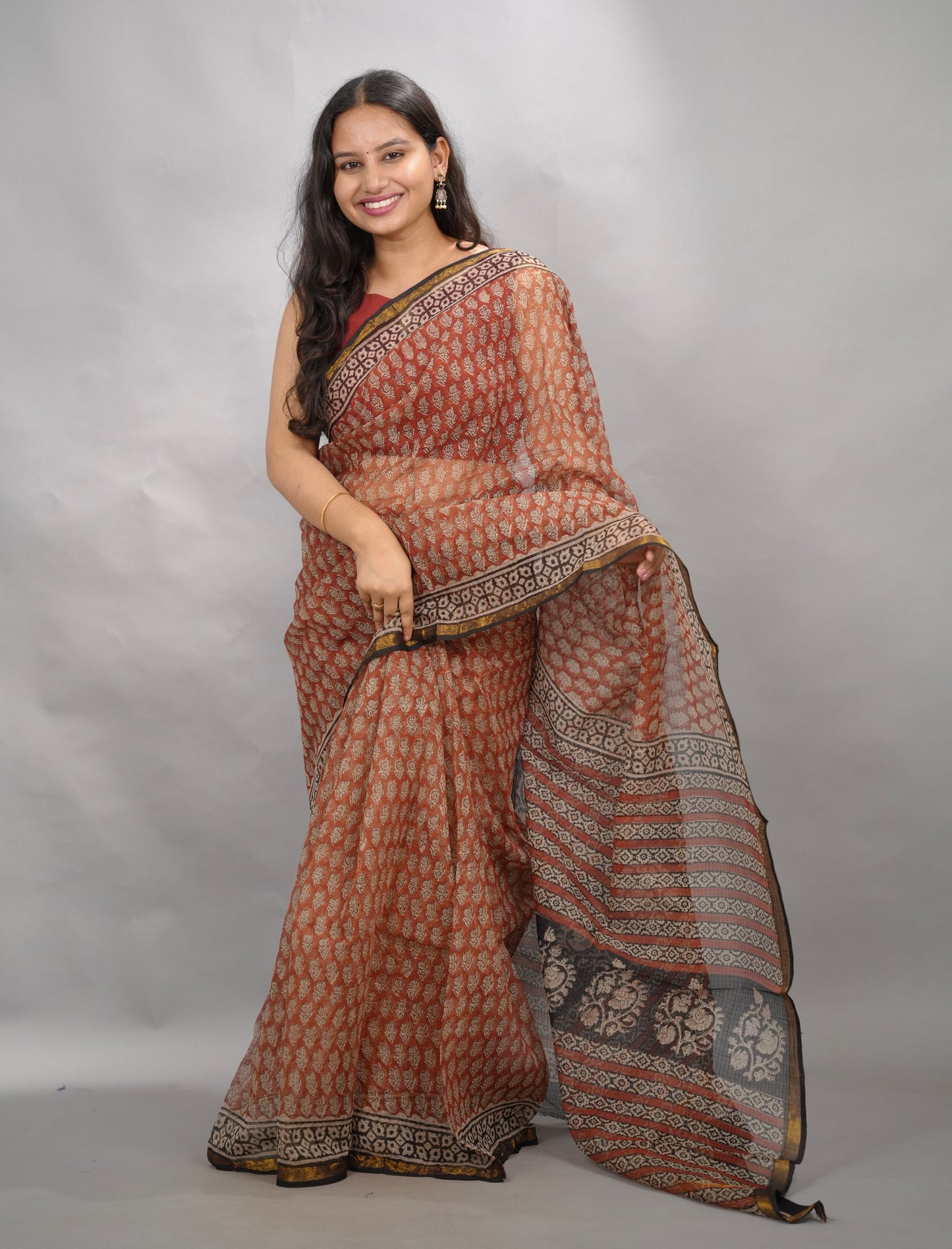 Maroon Pure Kota Doria Saree with Bagru Handblock Prints | Looms & Tassels