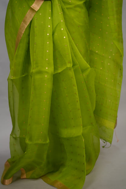 Parrot Green Handwoven Muslin Silk Saree With Sequence Work | Looms & Tassels