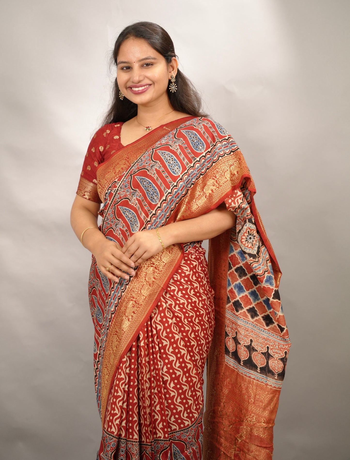Red Ajrakh Handblock printed Dola Silk Saree | Looms & Tassels