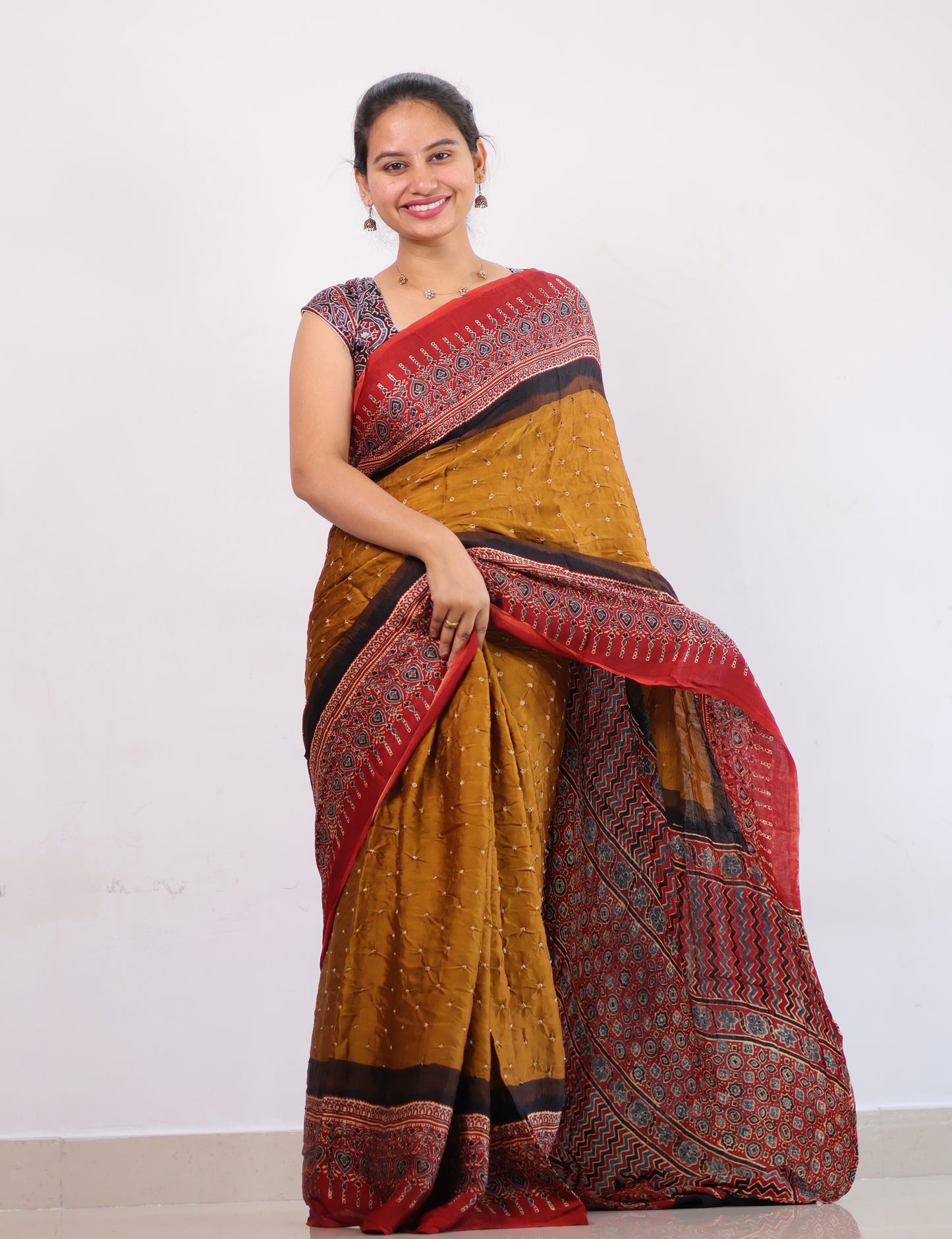 Mustard Ajrakh Bandhej Modal Silk Saree