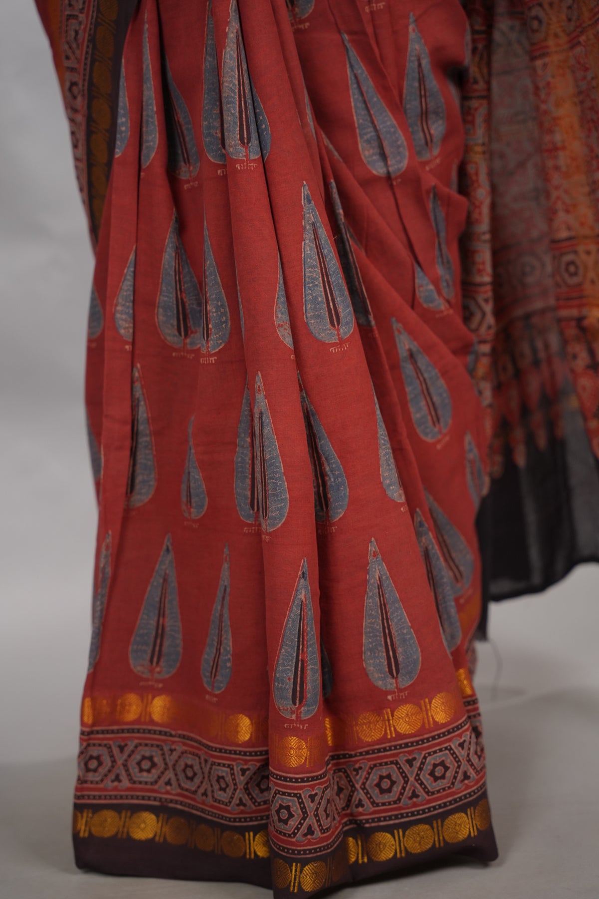 Maroon Ajrakh Hand Block Printed Sungudi Cotton Saree | Looms & Tassels