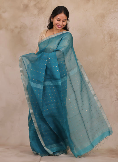 Teal Blue Handwoven Muslin Silk Saree With Sequence Work | Looms & Tassels
