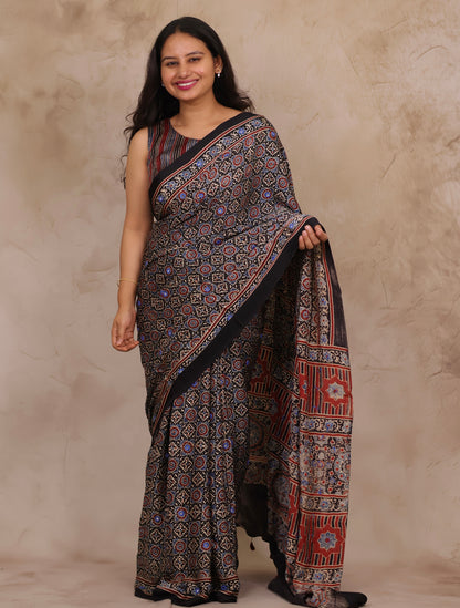 Black Handcrafted Ajrakh Modal Silk Saree with Authentic Banjara Mirror Work | Looms & Tassels