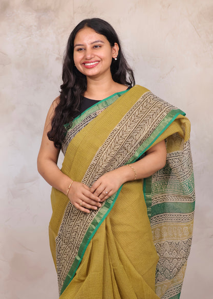 Yellow Pure Kota Doria Saree with Bagru Handblock Prints | Looms & Tassels