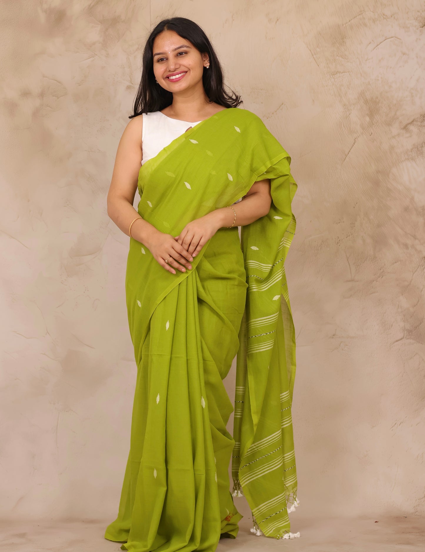 Parrot Green Malai Cotton Saree with Butta Weaving | Looms & Tassels