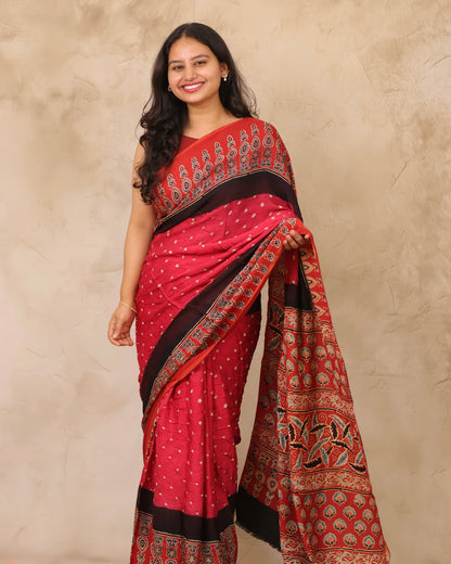 Pink Hand Knotted Ajrakh Bandhej Modal Silk Saree | Looms & Tassels