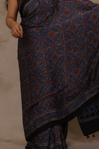 Indigo Handcrafted Ajrakh Modal Silk Saree with Authentic Banjara Mirror Work | Looms & Tassels