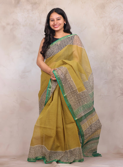 Yellow Pure Kota Doria Saree with Bagru Handblock Prints | Looms & Tassels