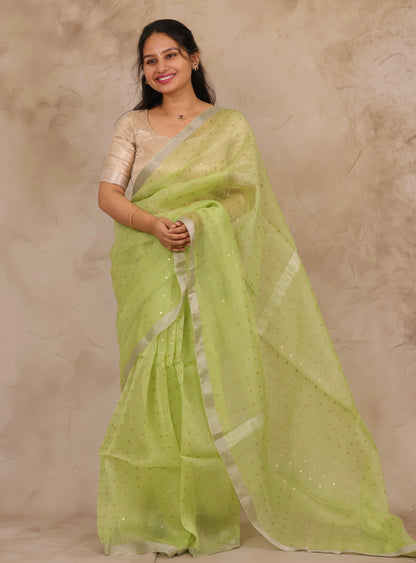 Pastel Lime Green Handwoven Muslin Silk Saree With Sequence Work | Looms & Tassels