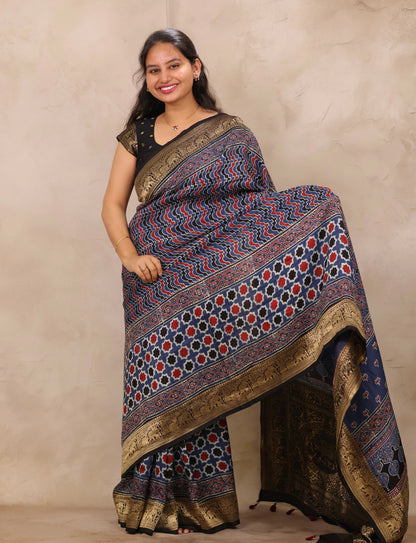 Indigo Ajrakh Handblock printed Dola Silk Saree | Looms & Tassels