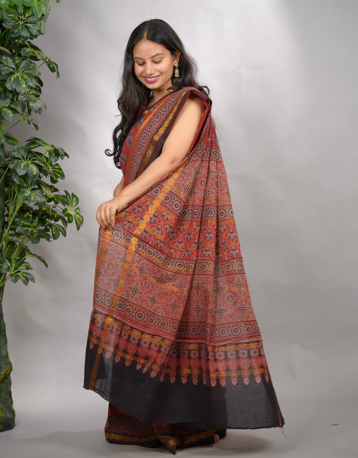 Maroon Ajrakh Hand Block Printed Sungudi Cotton Saree | Looms & Tassels