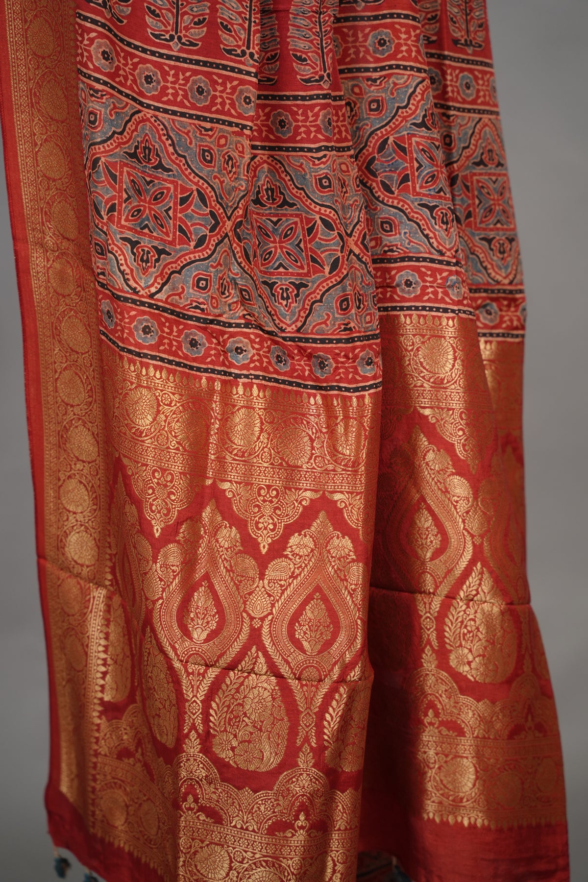 Maroon Ajrakh Handblock printed Dola Silk Saree| Looms & Tassels