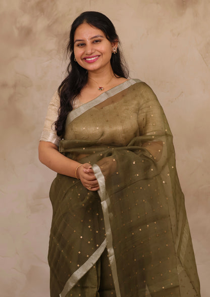 Olive Green Handwoven Muslin Silk Saree With Sequence Work | Looms & Tassels