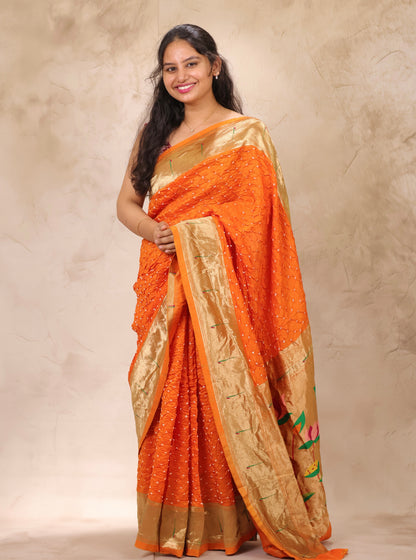 Orange Handcrafted Bandhani Paithani Dola Silk Saree | Looms & Tassels