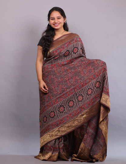 Brown Flower Butta Authentic Ajrakh Hand Block printed Dola Silk Saree | Looms & Tassels