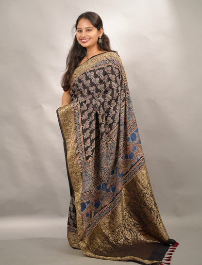 Black Ajrakh Handblock printed Dola Silk Saree | Looms & Tassels
