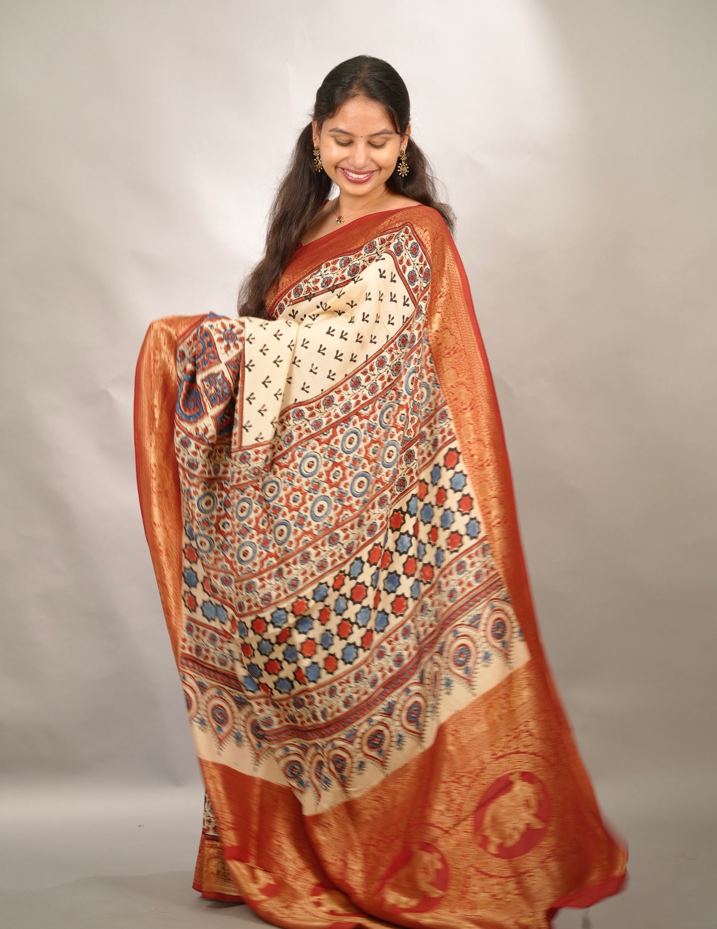 Cream Ajrakh Handblock printed Dola Silk Saree | Looms & Tassels