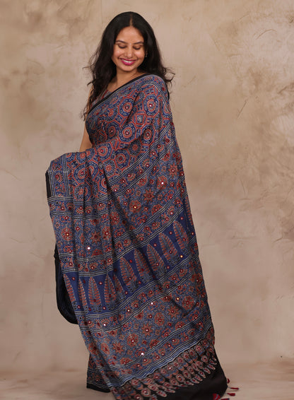 Indigo Handcrafted Ajrakh Modal Silk Saree with Authentic Banjara Mirror Work | Looms & Tassels