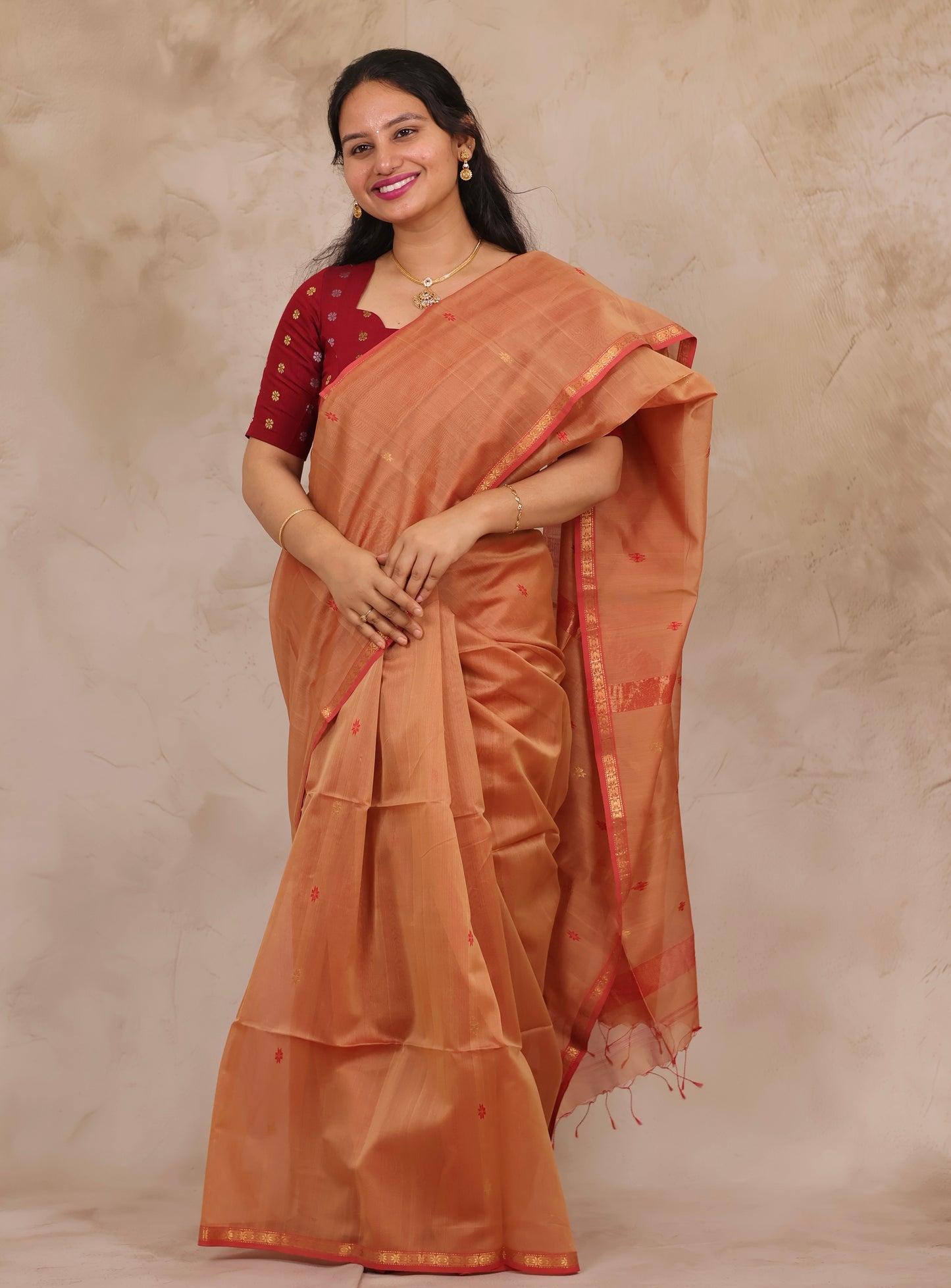 Peach Handloom Maheswari Silk Cotton Sarees | Looms & Tassels