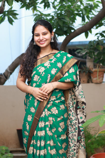 Green & Cream Elephant Kalamkari Silk Handcrafted Nizam Border Saree