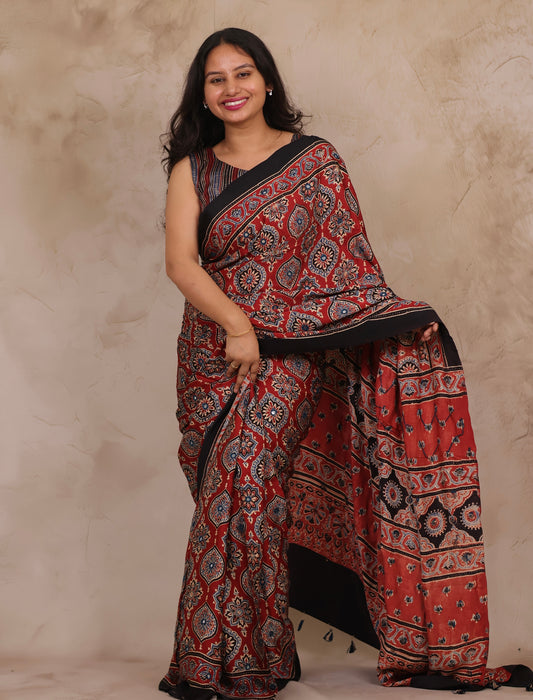 Red Handcrafted Ajrakh Modal Silk Saree with Authentic Banjara Mirror Work | Looms & Tassel