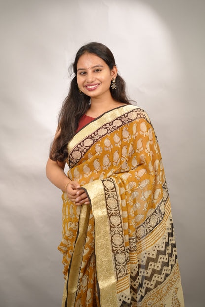 Mustard Chiffon Hand Block Printed Saree with Jari Border | Looms & Tassels