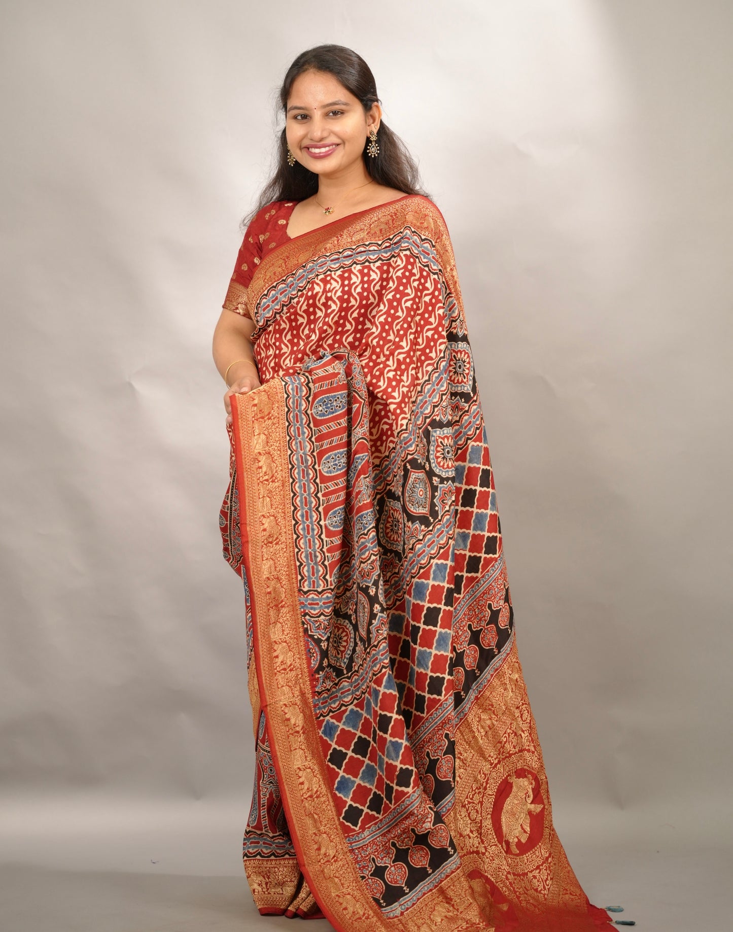 Red Ajrakh Handblock printed Dola Silk Saree | Looms & Tassels
