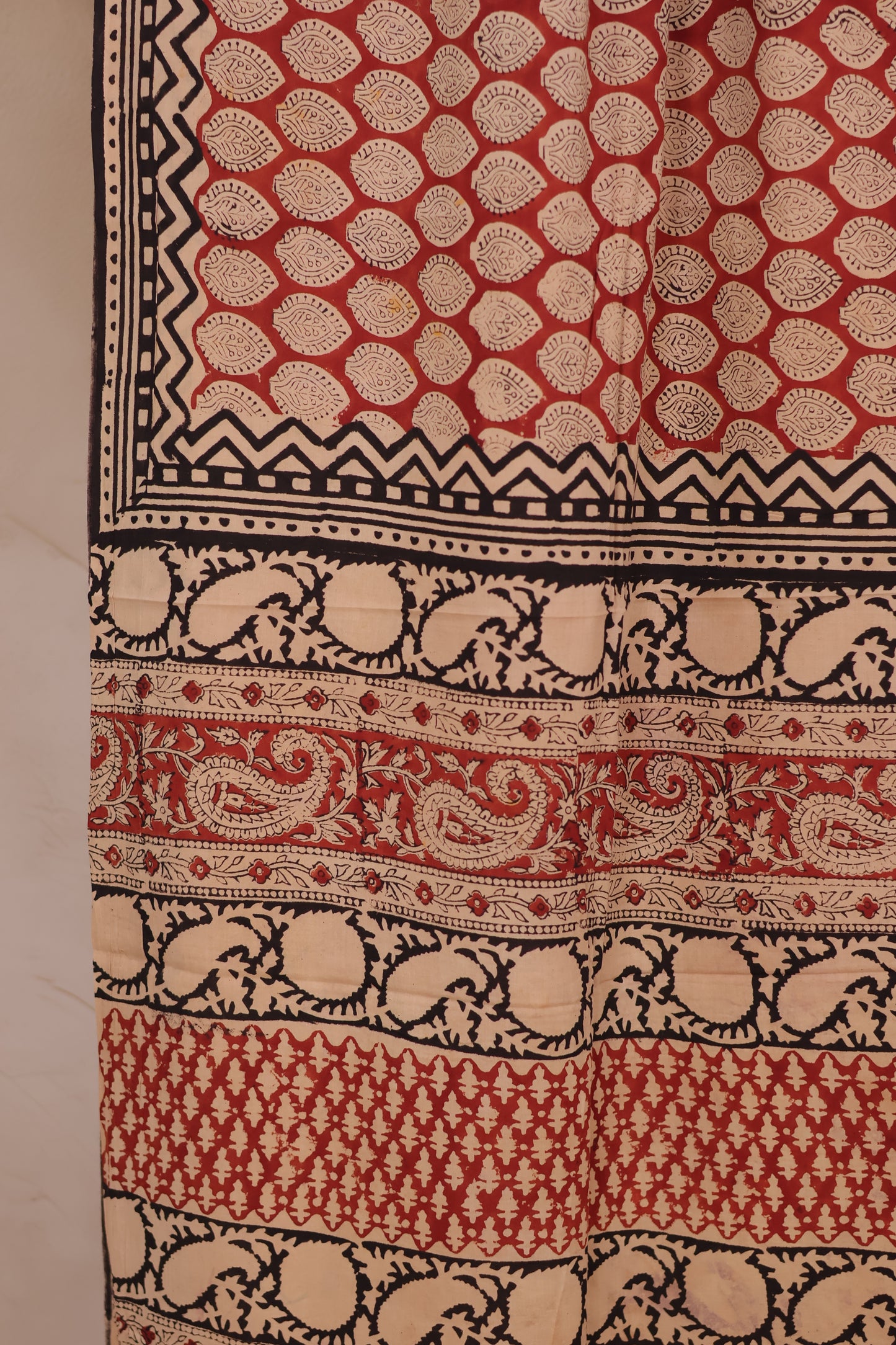 Brick Red & Cream Bagru Handblock printed MulMul cotton saree | Looms & Tassels