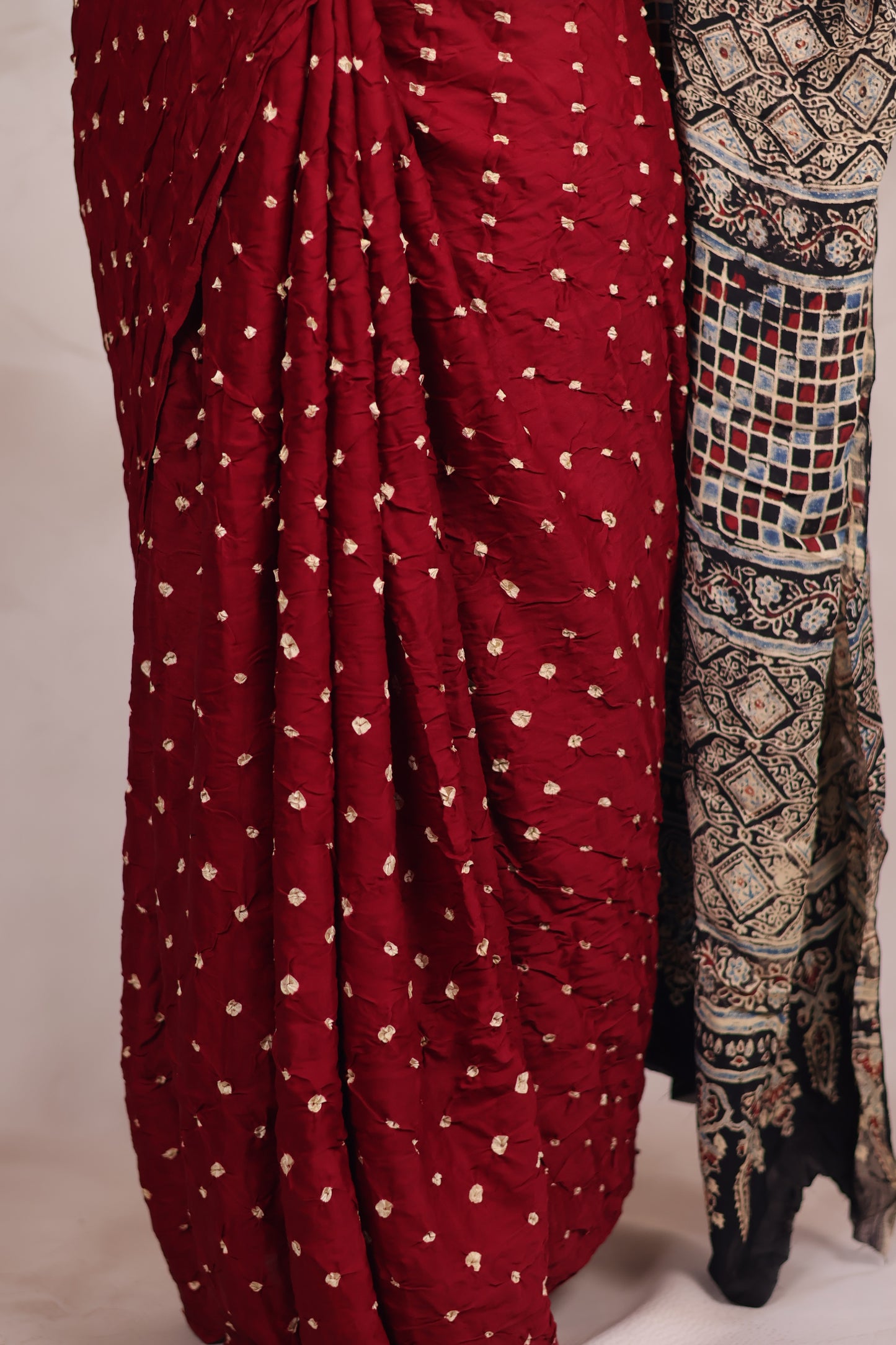 Maroon Hand Knotted Bandhej Modal Silk Saree with Ajrakh Pallu | Looms & Tassels