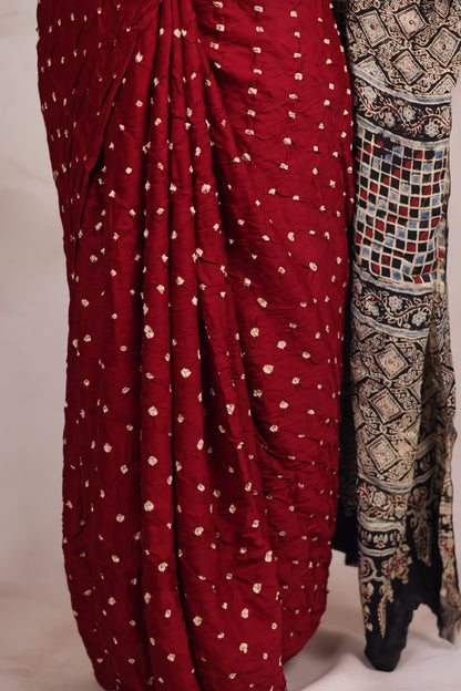 Maroon Hand Knotted Bandhej Modal Silk Saree with Ajrakh Pallu | Looms & Tassels