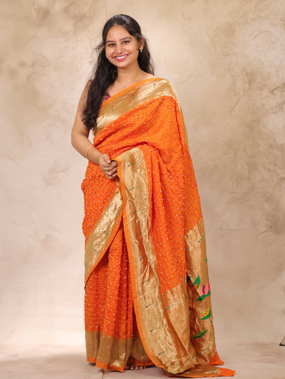 Orange Handcrafted Bandhani Paithani Dola Silk Saree | Looms & Tassels