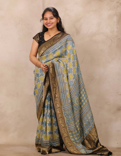 Sky Blue Ajrakh Handblock printed Dola Silk Saree | Looms & Tassels