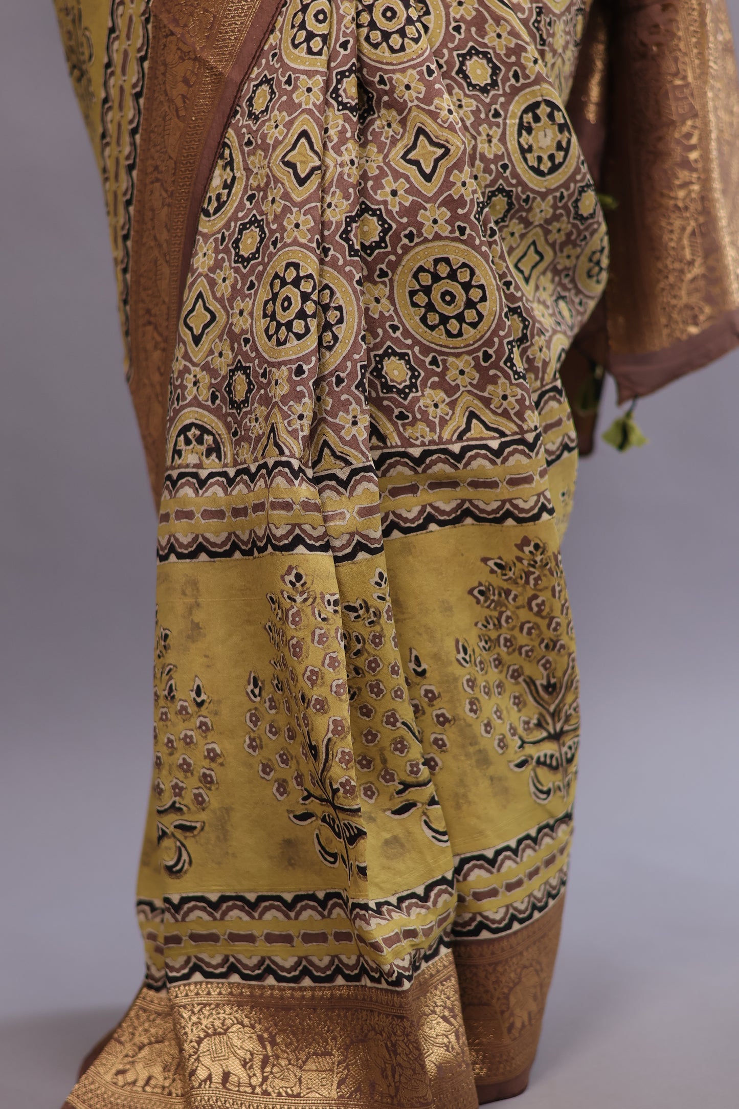 Olive Green Geometrical Authentic Ajrakh Hand Block printed  Dola Silk Saree | Looms & tassels