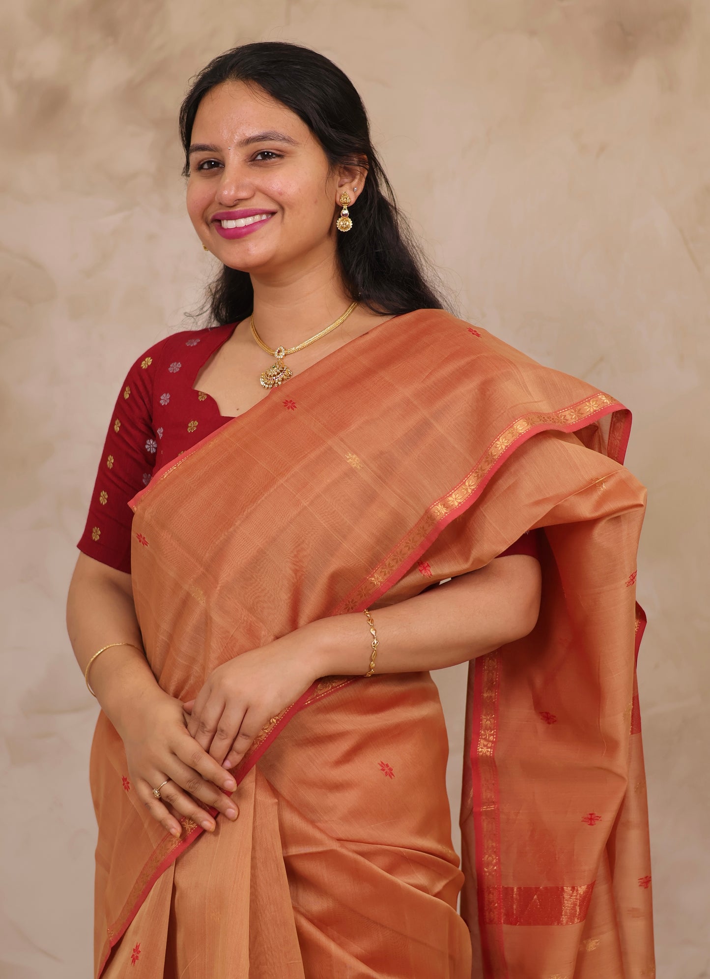 Peach Handloom Maheswari Silk Cotton Sarees | Looms & Tassels