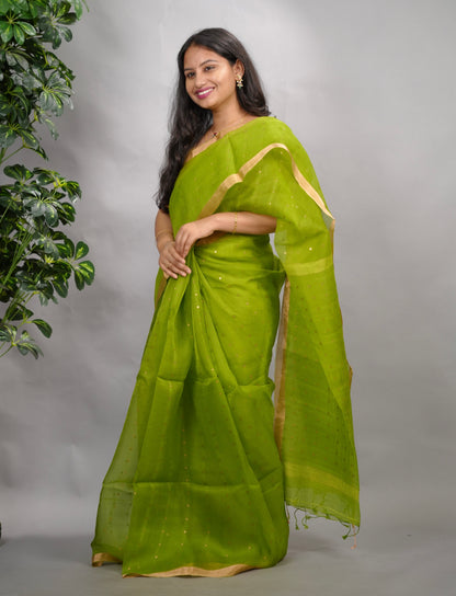 Parrot Green Handwoven Muslin Silk Saree With Sequence Work | Looms & Tassels