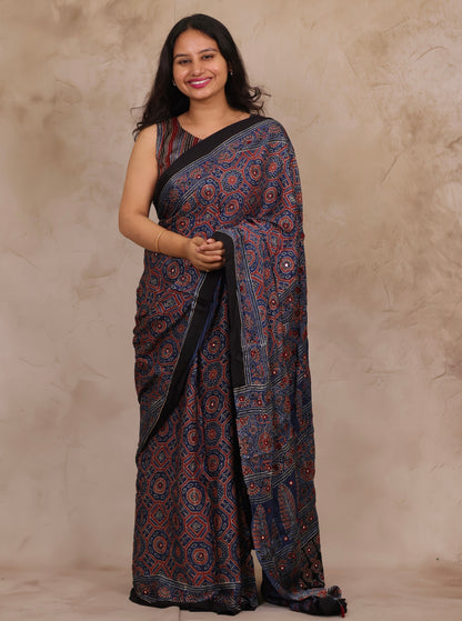 Indigo Handcrafted Ajrakh Modal Silk Saree with Authentic Banjara Mirror Work | Looms & Tassels