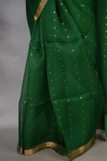 Bottle Green Handwoven Muslin Silk Saree With Sequence Work | Looms & Tassels